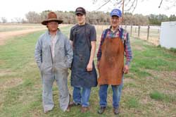 Three men standing in a row (from left: Kevin Willey, Jeff Kraft, and Herman Kraft - teacher).