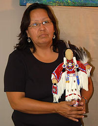 Mary White Country (woman) with beaded doll